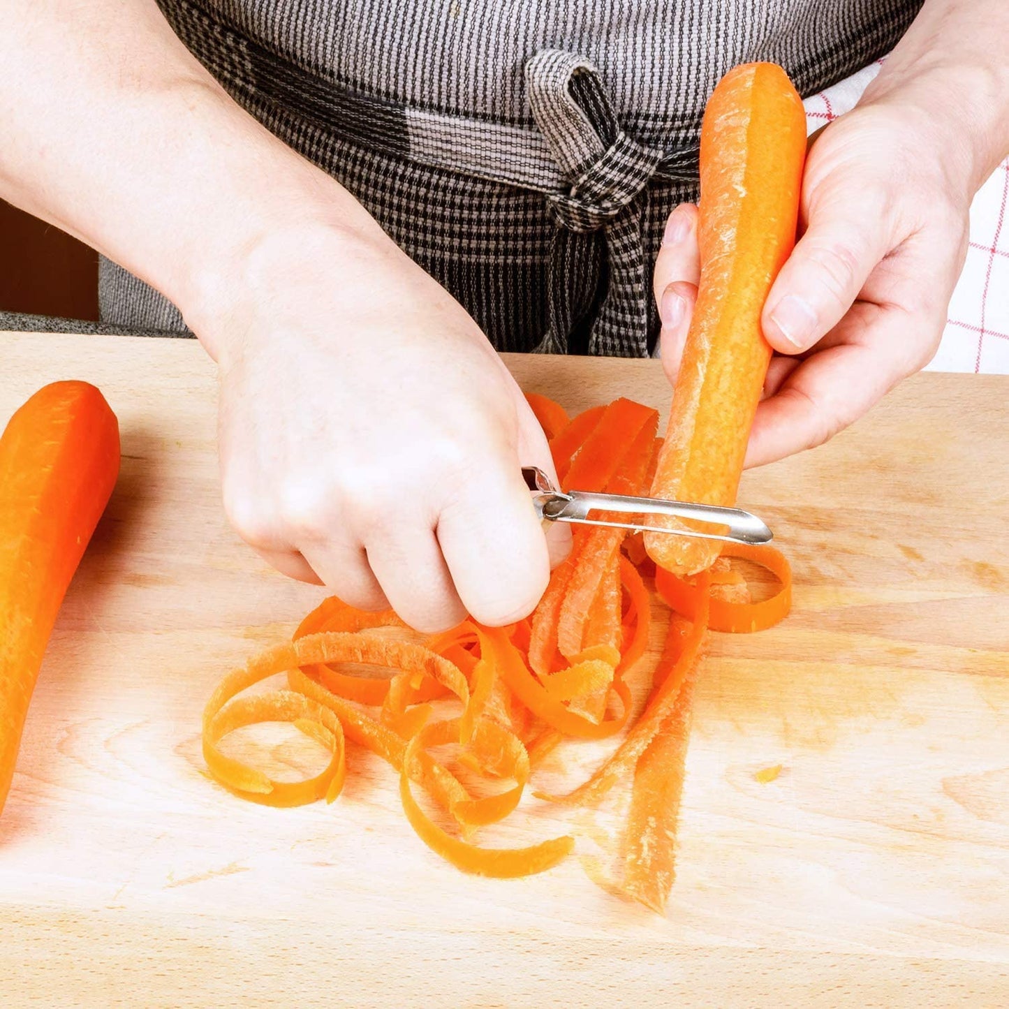 
                  
                    Bene Casa Stainless Steel Vegetable Peeler, Ergonomic Handle for Safety and Control, Dishwasher Safe
                  
                