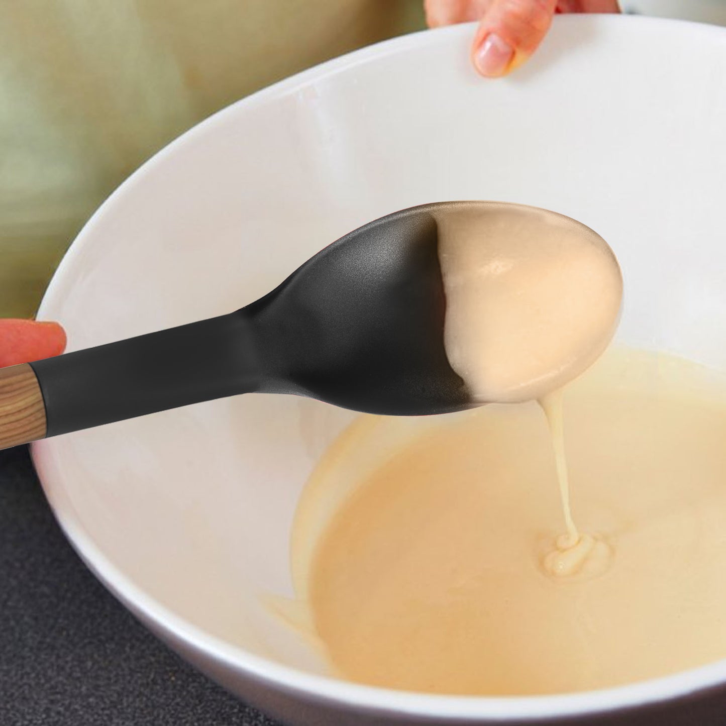 
                  
                    Bene Casa Black Spoon with Wood Like Handle, Heat Resistant
                  
                