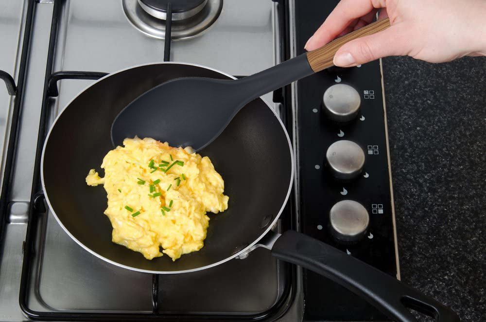 
                  
                    Bene Casa Black Spoon with Wood Like Handle, Heat Resistant
                  
                