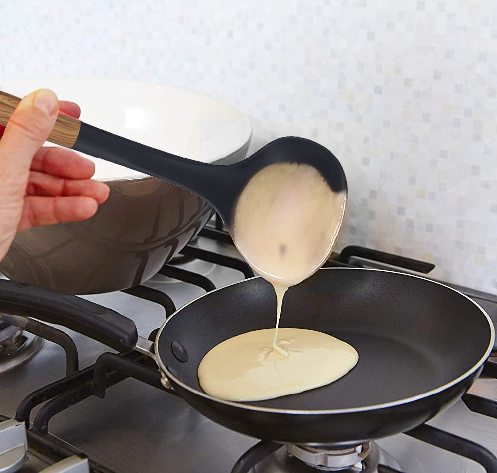 
                  
                    Bene Casa Black Ladle with Wood Like Handle, Heat Resistant
                  
                