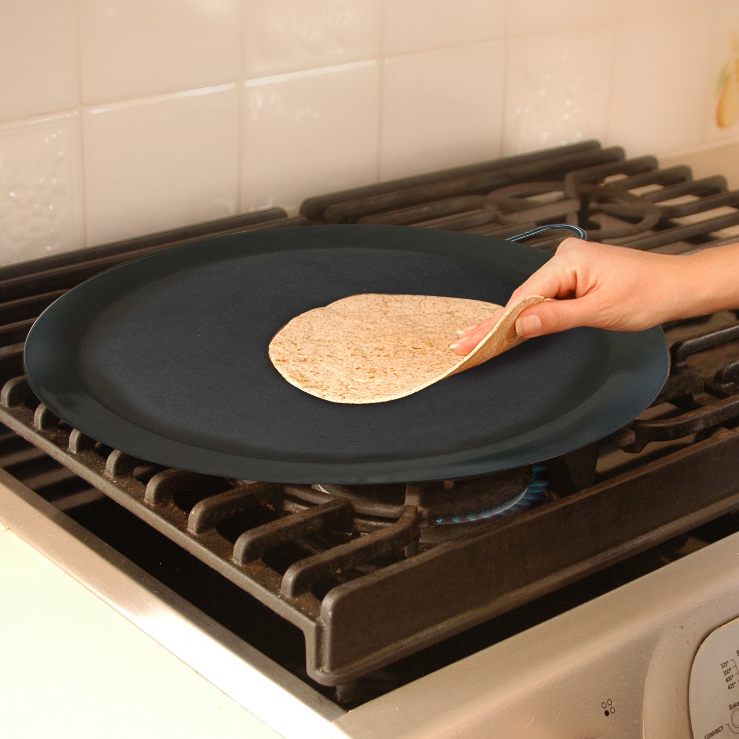 
                  
                    Bene Casa 12-inch diameter, non-stick, round steel pan with single metal handle
                  
                